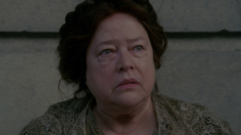 Kathy Bates Madame Delphine somber