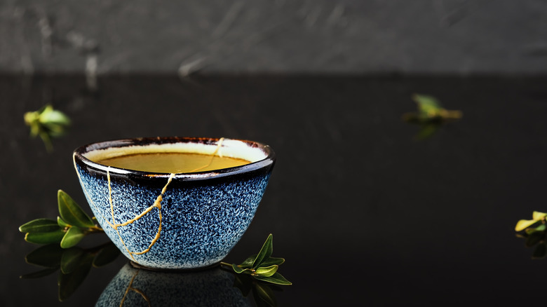 A bowl with gold lacquer