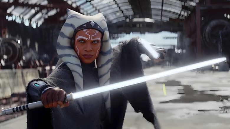 Ahsoka's Ahsoka holding two lightsabers in battle