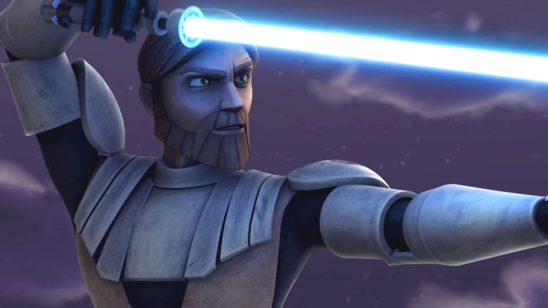 Obi-Wan Kenobi holding his lightsaber