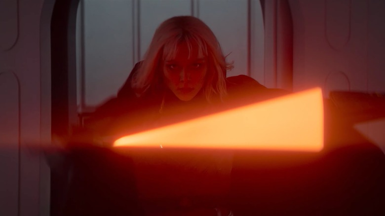 Shin Hati wielding an orange lightsaber