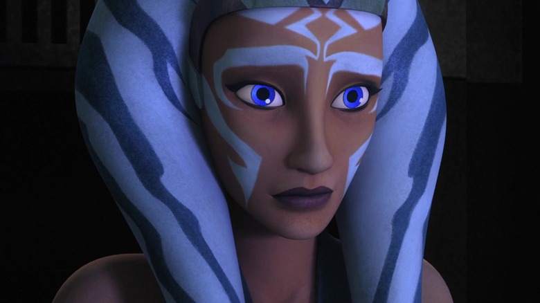 Ahsoka in darkness looking thoughtful