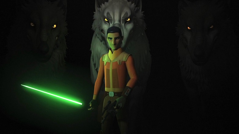 Ezra Bridger holds green lightsaber