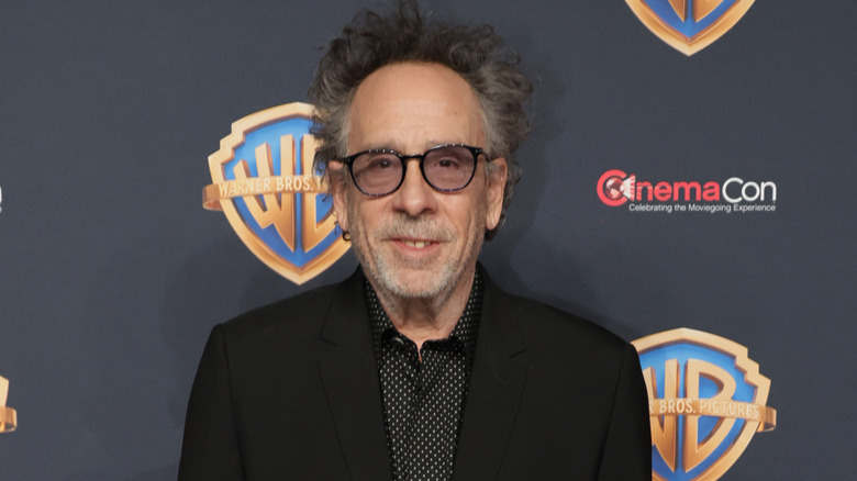 Tim Burton smiling at camera