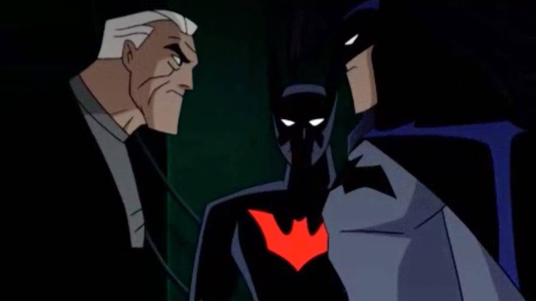 Older Bruce Wayne with younger Batmen