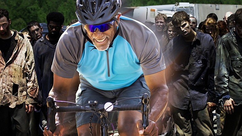 Biker riding away from zombies