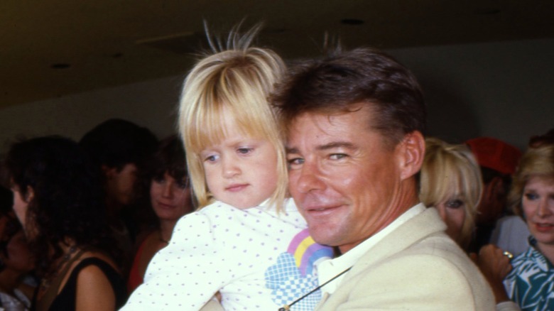 Jan Michael-Vincent and daughter smiling