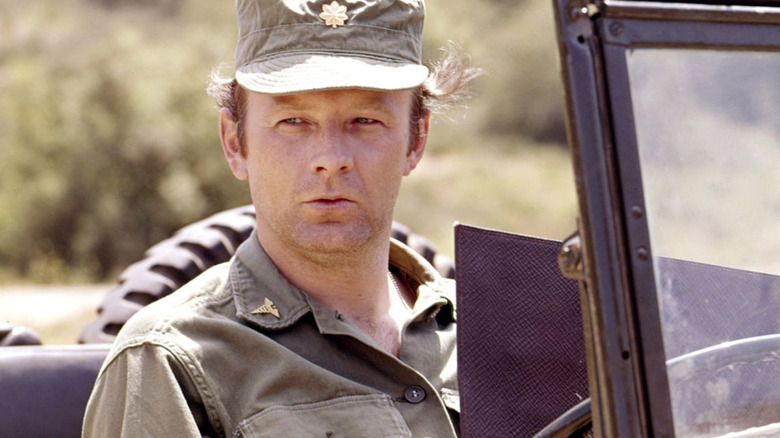 Larry Linville looks on M*A*S*H