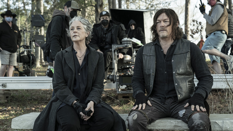 Melissa McBride and Norman Reedus on set of The Walking Dead