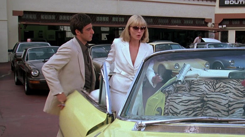 Michelle Pfeiffer and Al Pacino getting into car