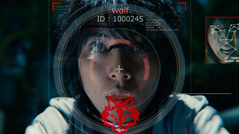 Ryōhei Arisu looking worried, overlaid with an identifier of him as the wolf