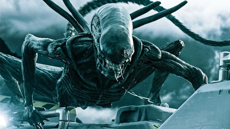 A Xenomorph snarling with drool in Alien: Covenant (2017)