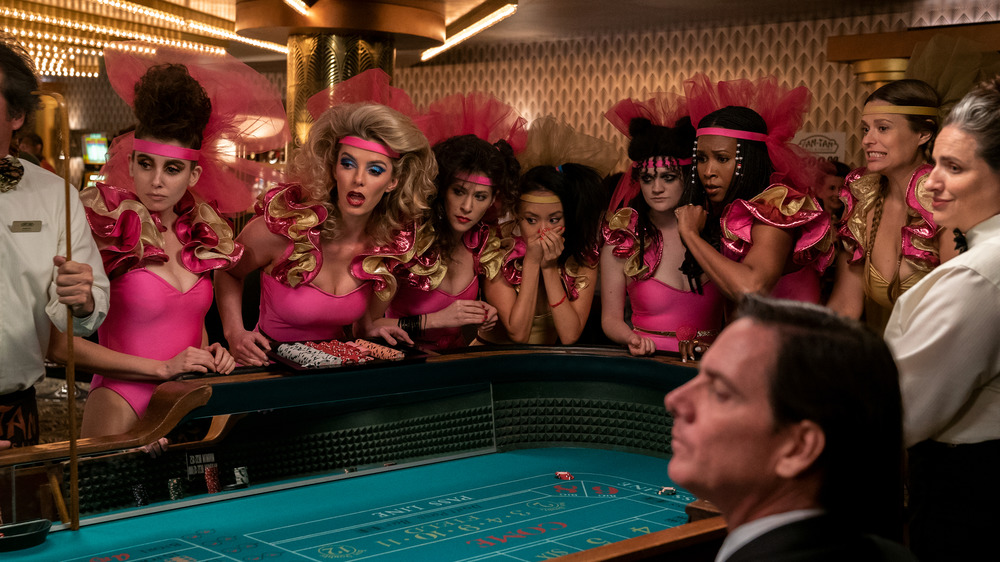 Betty Gilpin and cast in GLOW