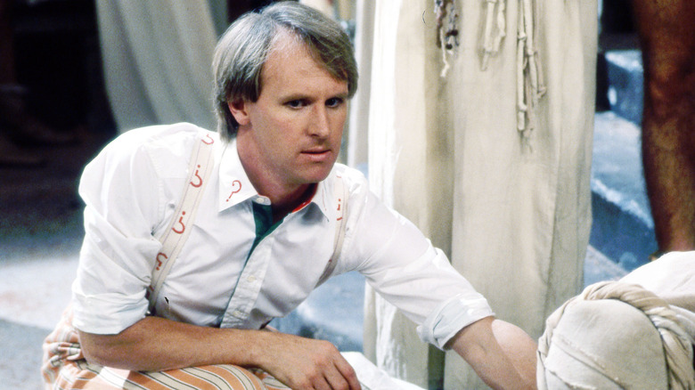 the fifth doctor kneeling in thought