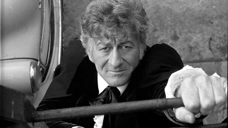 The third doctor climbing ladder