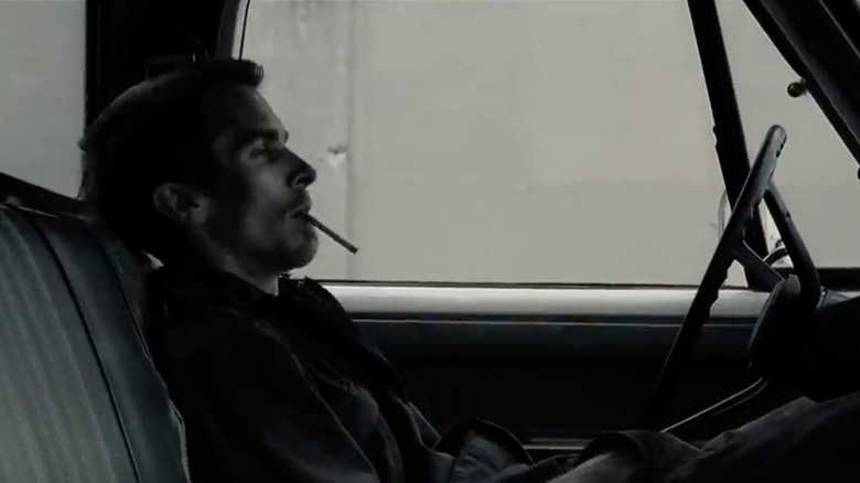 Trevor Reznik smokes in his vehicle