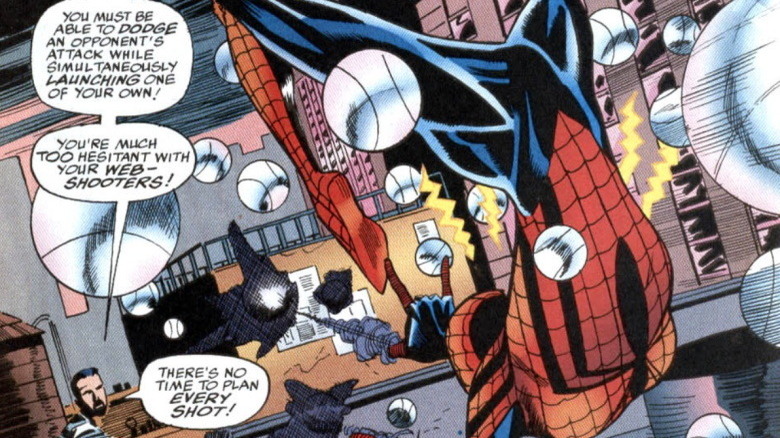 Spider-Girl firing web-shooters