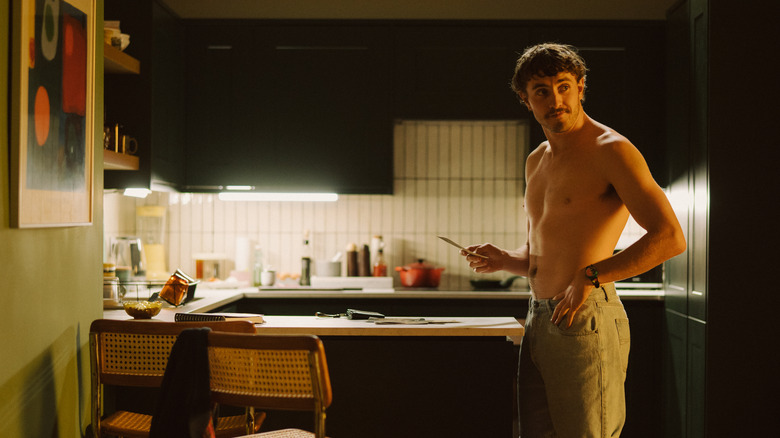 Harry shirtless in the kitchen