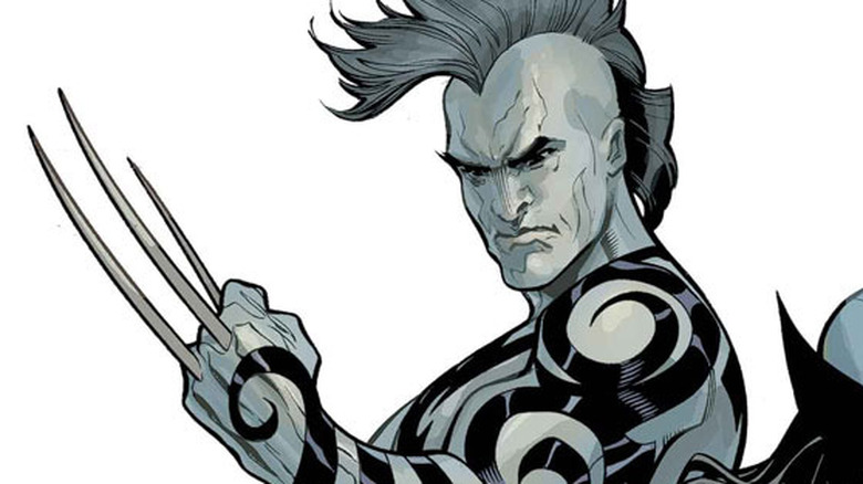 Daken striking defensive pose with mohawk and tattooed arm