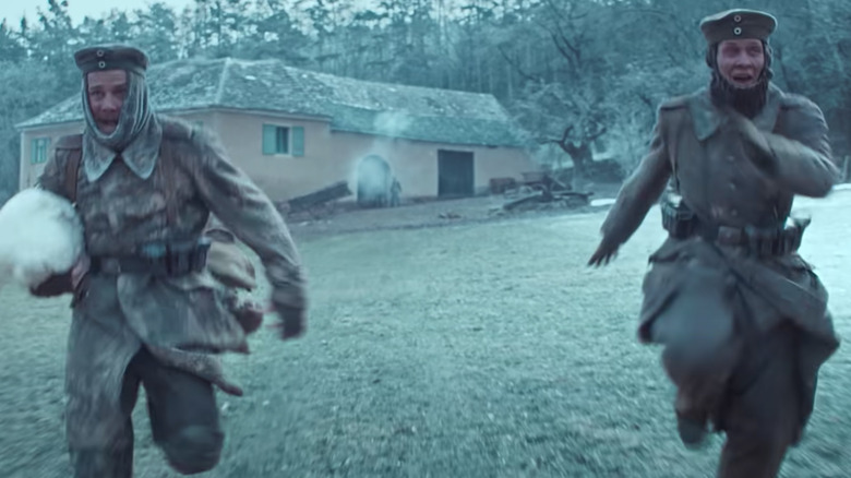 Soldiers running with chicken