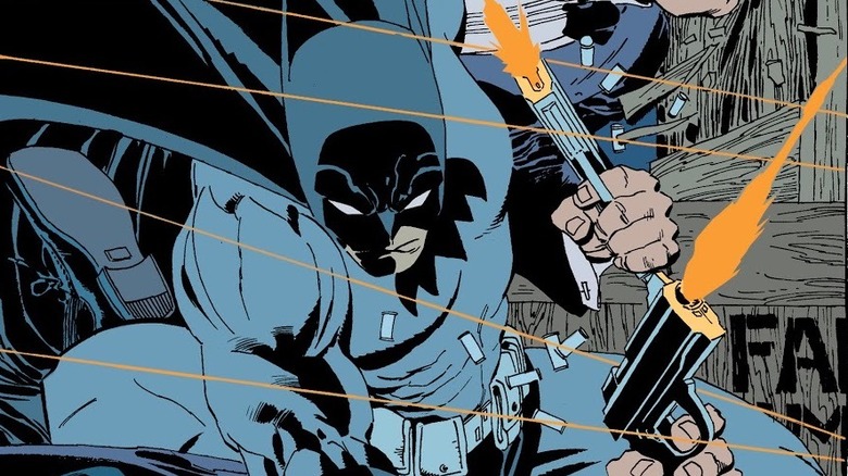 Batman stopping a shooter