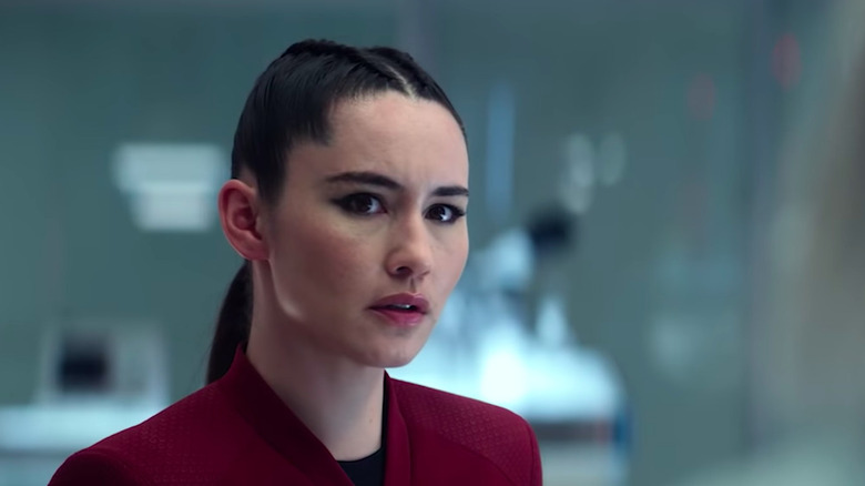 La'an Noonien-Singh (played by Christina Chong) looking at Nurse Christine Chapel (played by Jess Bush)