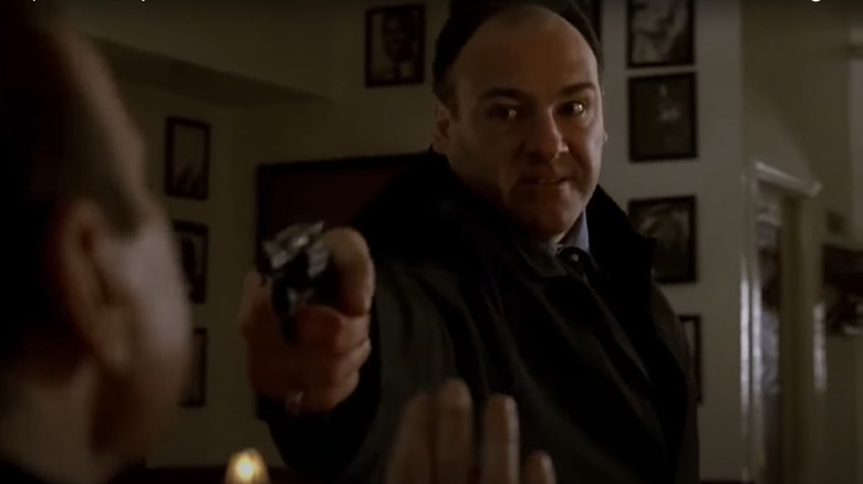 Tony Soprano points a gun