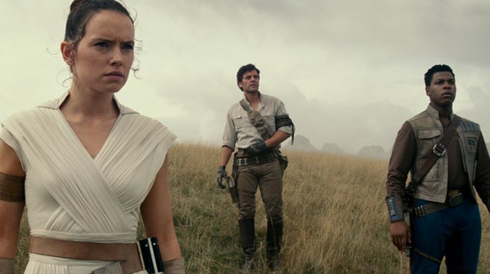 Daisy Ridley, Oscar Isaac, and John Boyega in Star Wars The Rise of Skywalker