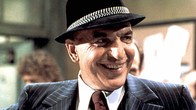 Theo Kojak smiles