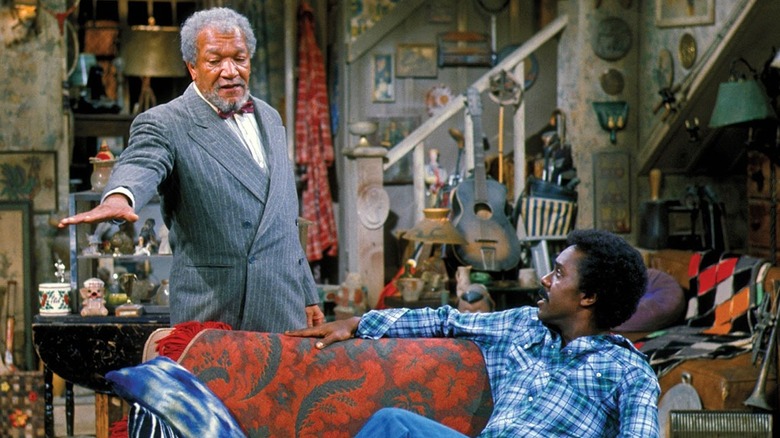 Fred Sanford stands over Lamont Sanford