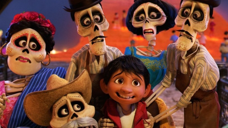 Miguel surrounded by skeleton figures