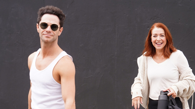 Sasha Farber and Alyson Hannigan pose for photos