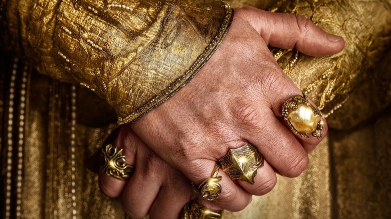 Hand with gold rings