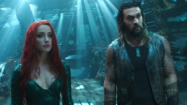 Mera and Arthur staring listening