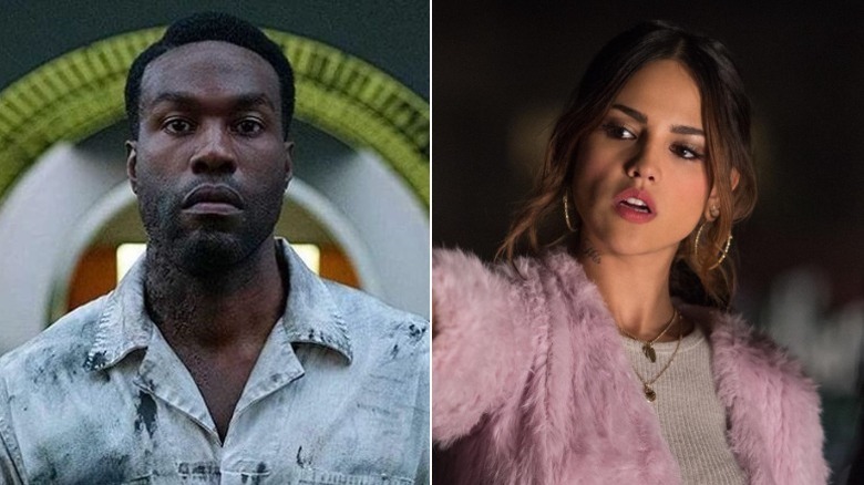 Yahya Abdul-Mateen II staring ahead and Eiza Gonzalez in pink jacket