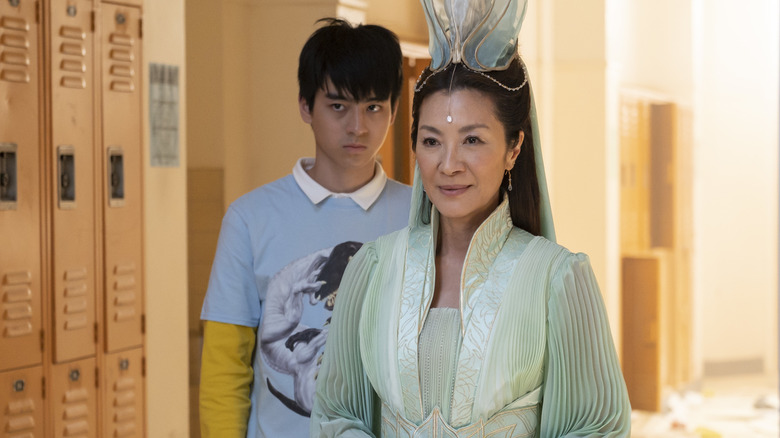 Guanyin and Jin Wang in school hallway