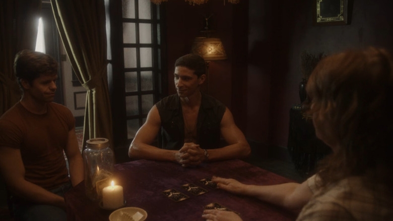 Fran does a tarot reading for Adam and Theo