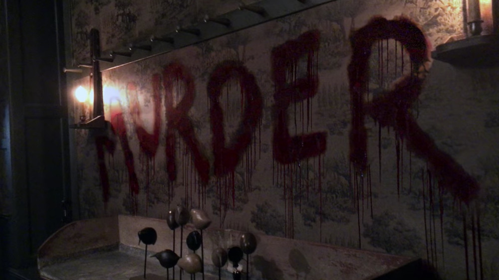 "Murder" painted in blood