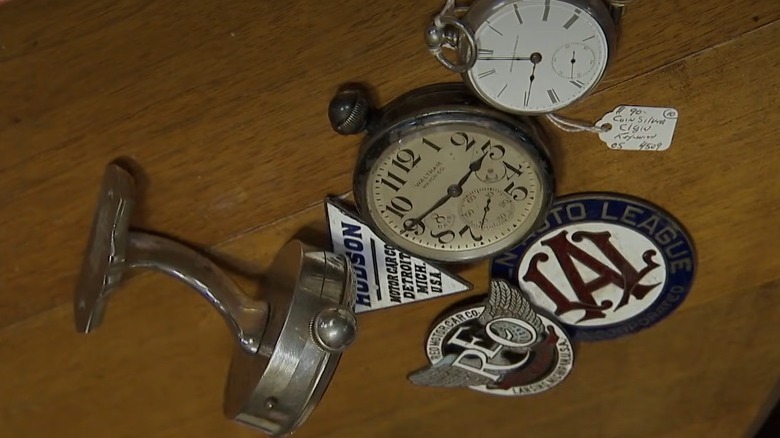 Collection of stopwatches and car ornaments