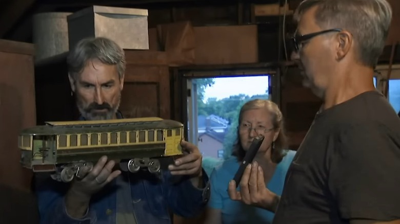 Mike and Robbie Wolfe looking at a train