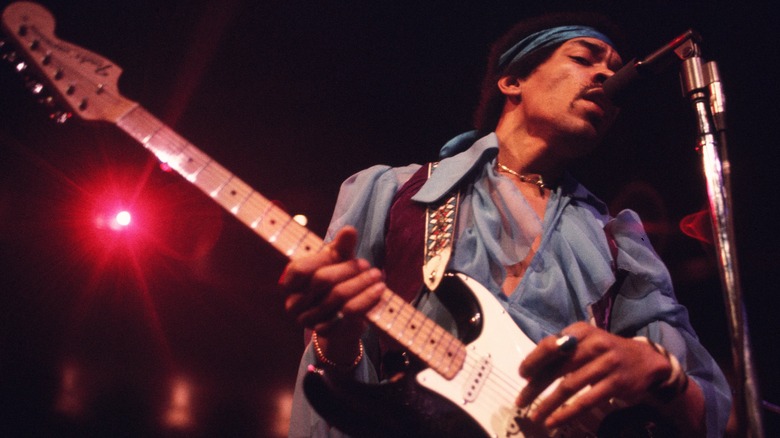 Jimi Hendrix playing guitar