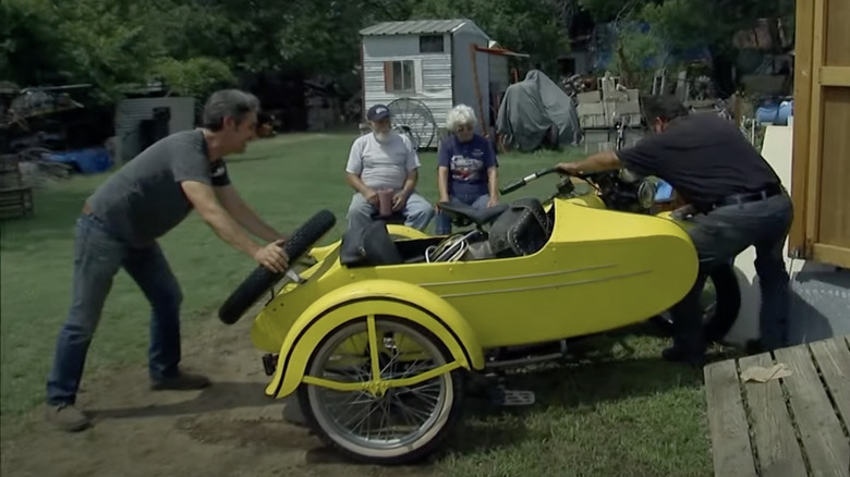 Mike and Frank picking a 1934 Harley-Davidson