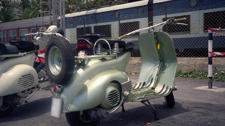 A light green vespa