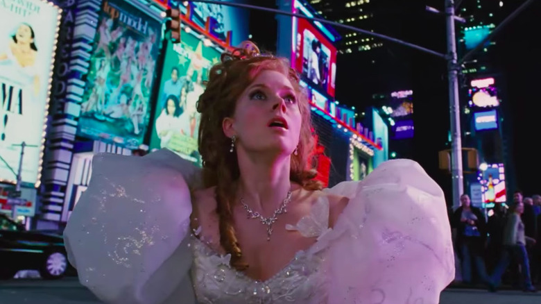 Giselle rises out of a manhole cover in 'Enchanted'