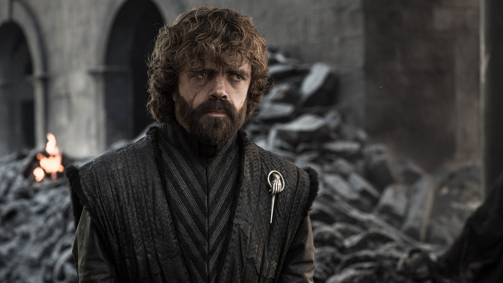 Tyrion Lannister standing in ruins