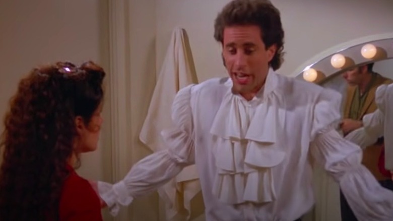 Julia Louis-Dreyfus with Jerry Seinfeld wearing the puffy shirt 