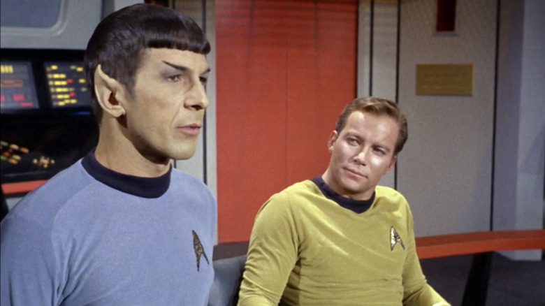 Captain Kirk listens to Spock
