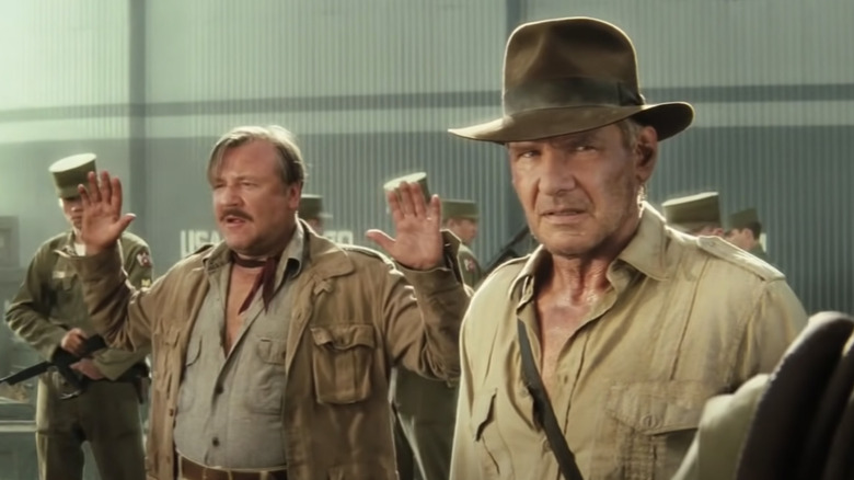 Indiana Jones being threatened 