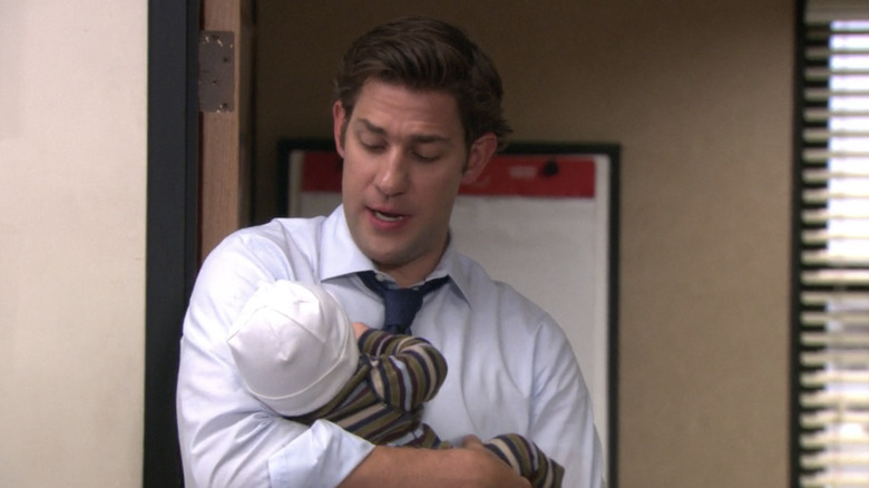 Jim holding baby