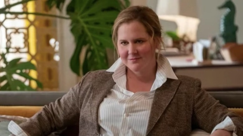 Amy Schumer smiling on Only Murders